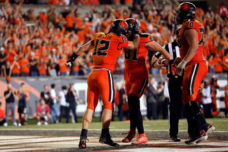 Oct 15, 2022; Corvallis, Oregon, USA; Oregon State Beavers inside linebacker Jack Colletto (12) celebrates with teammates after scoring a touchdown during the second half Washington State Cougars at Reser Stadium. Mandatory Credit: Soobum Im-USA TODAY Sports