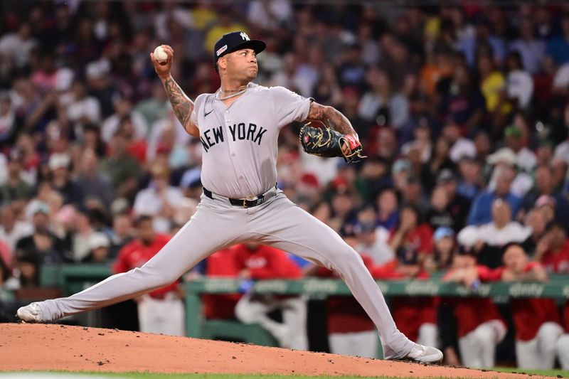 Jun 14, 2024; Boston, Massachusetts, USA; New York Yankees starting pitcher Luis Gil (81) pitches against the Boston Red Sox during the third inning at Fenway Park. Mandatory Credit: Eric Canha-USA TODAY Sports