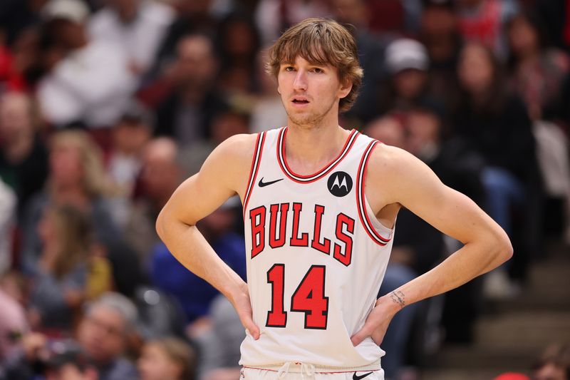 CHICAGO, ILLINOIS - OCTOBER 18: Matas Buzelis #14 of the Chicago Bulls looks on against the Cleveland Cavaliers during the second half of a preseason game at the United Center on October 18, 2024 in Chicago, Illinois. NOTE TO USER: User expressly acknowledges and agrees that, by downloading and or using this photograph, User is consenting to the terms and conditions of the Getty Images License Agreement.  (Photo by Michael Reaves/Getty Images)