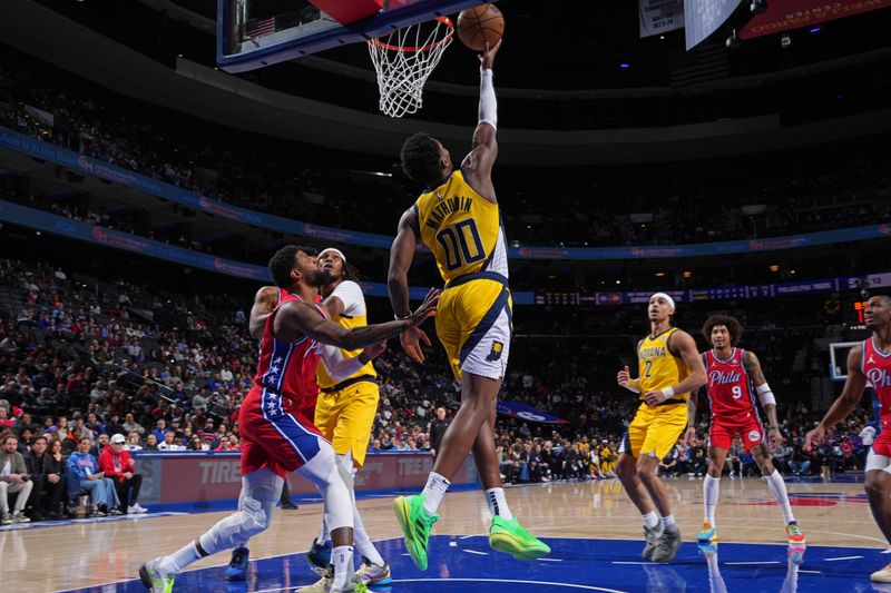 PHILADELPHIA, PA - DECEMBER 13: Bennedict Mathurin #00 of the Indiana Pacers drives to the basket during the game against the Philadelphia 76ers on December 13, 2024 at the Wells Fargo Center in Philadelphia, Pennsylvania NOTE TO USER: User expressly acknowledges and agrees that, by downloading and/or using this Photograph, user is consenting to the terms and conditions of the Getty Images License Agreement. Mandatory Copyright Notice: Copyright 2024 NBAE (Photo by Jesse D. Garrabrant/NBAE via Getty Images)