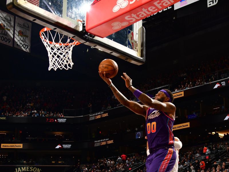 PHOENIX, AZ - FEBRUARY 29: Royce O'Neal #00 of the Phoenix Suns drives to the basket during the game against the Houston Rockets on February 29, 2023 at Footprint Center in Phoenix, Arizona. NOTE TO USER: User expressly acknowledges and agrees that, by downloading and or using this photograph, user is consenting to the terms and conditions of the Getty Images License Agreement. Mandatory Copyright Notice: Copyright 2023 NBAE (Photo by Kate Frese/NBAE via Getty Images)