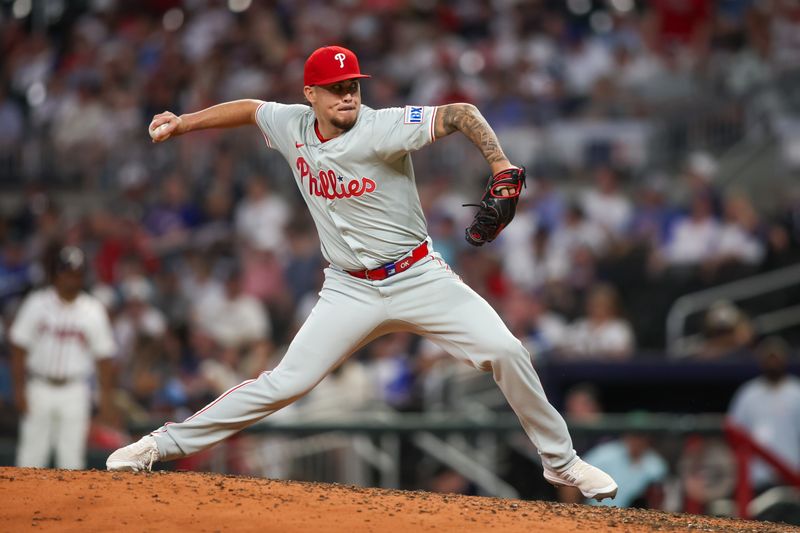 Aug 21, 2024; Atlanta, Georgia, USA; Philadelphia Phillies relief pitcher Orion Kerkering (50) throws against the Atlanta Braves in the eighth inning at Truist Park. Mandatory Credit: Brett Davis-USA TODAY Sports