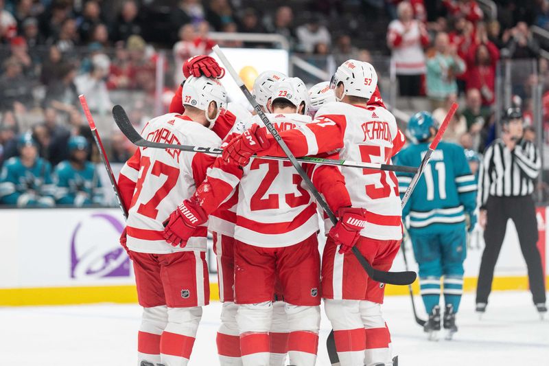 Jan 2, 2024; San Jose, California, USA; Detroit Red Wings left wing Lucas Raymond (23) celebrates with his teammates during the first period against the San Jose Sharks at SAP Center at San Jose. Mandatory Credit: Stan Szeto-USA TODAY Sports