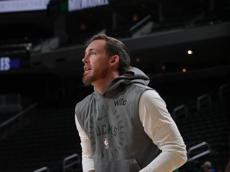 MILWAUKEE, WI - OCTOBER 10: Pat Connaughton #24 of the Milwaukee Bucks shoots the ball before the game against the Los Angeles Lakers during a preseason game on October 10, 2024 at Fiserv Forum Center in Milwaukee, Wisconsin. NOTE TO USER: User expressly acknowledges and agrees that, by downloading and or using this Photograph, user is consenting to the terms and conditions of the Getty Images License Agreement. Mandatory Copyright Notice: Copyright 2024 NBAE (Photo by Gary Dineen/NBAE via Getty Images).