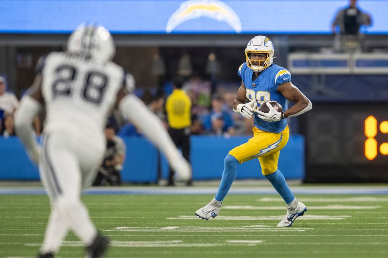 Los Angeles Chargers tight end Donald Parham Jr. (89) runs with the ball during an NFL football game against the Dallas Cowboys, Monday, Oct. 16, 2023, in Inglewood, Calif. (AP Photo/Kyusung Gong)