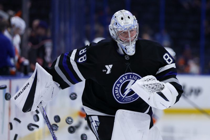 Feb 1, 2025; Tampa, Florida, USA; Tampa Bay Lightning goaltender Andrei Vasilevskiy (88) warms up before a game against the New York Islanders at Amalie Arena. Mandatory Credit: Nathan Ray Seebeck-Imagn Images