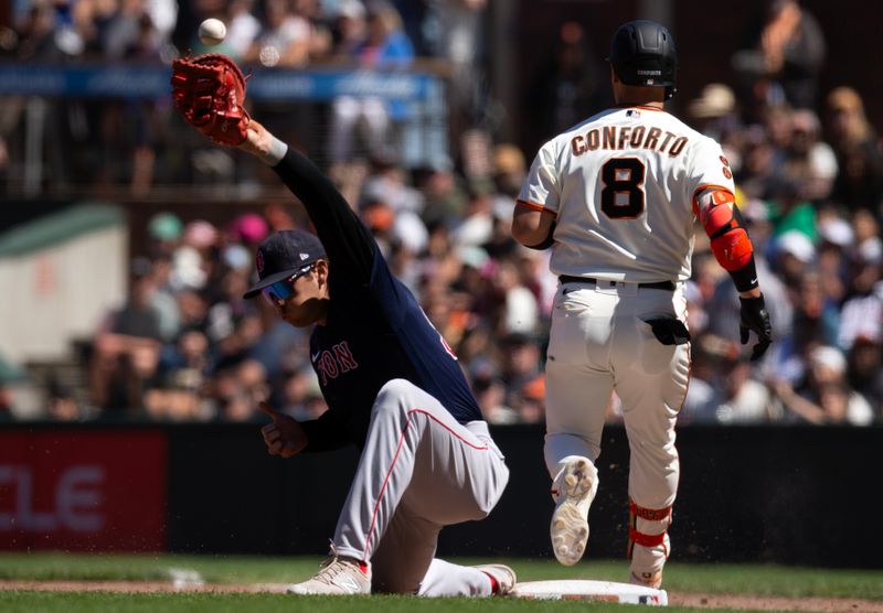 Jul 30, 2023; San Francisco, California, USA; Boston Red Sox first baseman Triston Casas (36) cannot handle the throw on an infield single by San Francisco Giants right fielder Michael Conforto (8) during the eighth inning at Oracle Park. Mandatory Credit: D. Ross Cameron-USA TODAY Sports