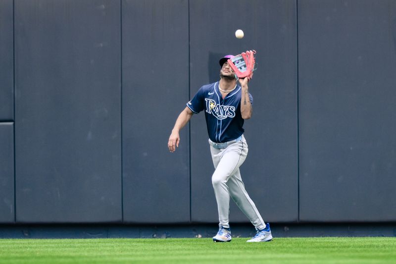 Jul 21, 2024; Bronx, New York, USA; Tampa Bay Rays outfielder Jose Siri (22) catches a fly ball for an out during the third inning against the New York Yankees at Yankee Stadium. Mandatory Credit: John Jones-USA TODAY Sports