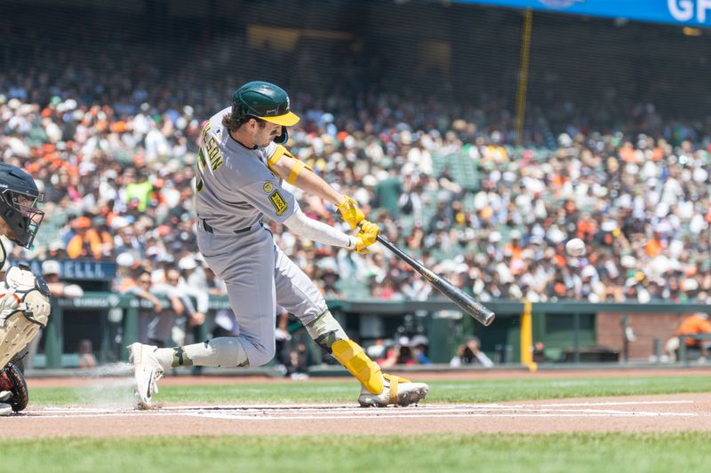 May 18, 2025; San Francisco, California, USA; Oakland Athletics shortstop Jacob Wilson (5) doubles during the first inning against the San Francisco Giants at Oracle Park. Mandatory Credit: Bob Kupbens-Imagn Images
