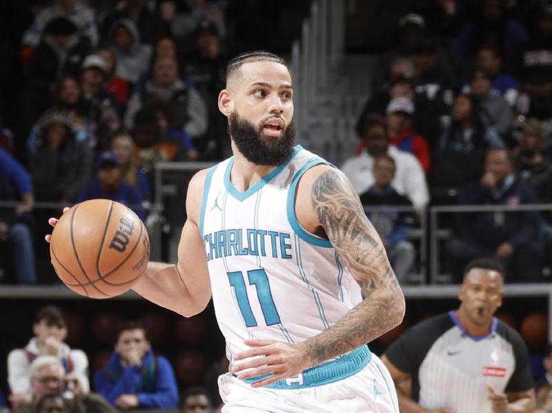 DETROIT, MI - JANUARY 03:  Cody Martin #11 of the Charlotte Hornets handles the ball during the game against the Detroit Pistons on January 03, 2025 at Little Caesars Arena in Detroit, Michigan. NOTE TO USER: User expressly acknowledges and agrees that, by downloading and/or using this photograph, User is consenting to the terms and conditions of the Getty Images License Agreement. Mandatory Copyright Notice: Copyright 2025 NBAE (Photo by Brian Sevald/NBAE via Getty Images)