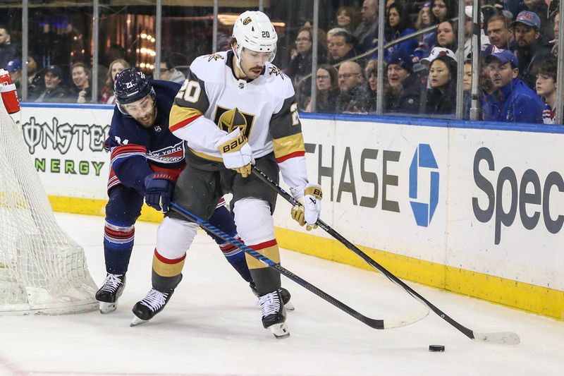 Jan 26, 2024; New York, New York, USA; New York Rangers center Barclay Goodrow (21) and Vegas Golden Knights center Chandler Stephenson (20) battle for control of the puck in the first period at Madison Square Garden. Mandatory Credit: Wendell Cruz-USA TODAY Sports