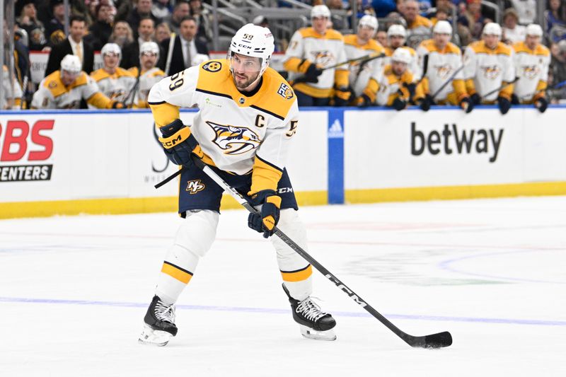 Feb 17, 2024; St. Louis, Missouri, USA; Nashville Predators defenseman Roman Josi (59) controls the puck against the St. Louis Blues during the first period at Enterprise Center. Mandatory Credit: Jeff Le-USA TODAY Sports