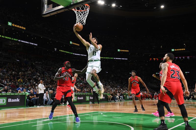 BOSTON, MA - OCTOBER 5: Jayson Tatum #0 of the Boston Celtics drives to the basket during the game against the Toronto Raptors on October 5, 2022 at the TD Garden in Boston, Massachusetts.  NOTE TO USER: User expressly acknowledges and agrees that, by downloading and or using this photograph, User is consenting to the terms and conditions of the Getty Images License Agreement. Mandatory Copyright Notice: Copyright 2022 NBAE  (Photo by Brian Babineau/NBAE via Getty Images)