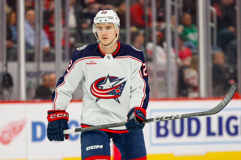 Mar 19, 2024; Detroit, Michigan, USA; Columbus Blue Jackets defenseman Jake Bean (22) looks on during the first period of the game against the Detroit Red Wings at Little Caesars Arena. Mandatory Credit: Brian Bradshaw Sevald-USA TODAY Sports