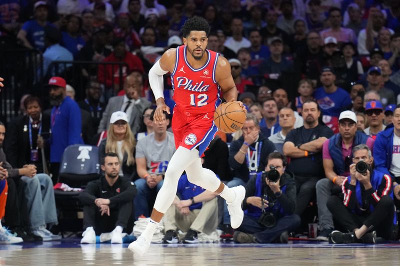 PHILADELPHIA, PA - APRIL 28: Tobias Harris #12 of the Philadelphia 76ers dribbles the ball during the game against the New York Knicks during Round 1 Game 4 of the 2024 NBA Playoffs on April 28, 2024 at the Wells Fargo Center in Philadelphia, Pennsylvania NOTE TO USER: User expressly acknowledges and agrees that, by downloading and/or using this Photograph, user is consenting to the terms and conditions of the Getty Images License Agreement. Mandatory Copyright Notice: Copyright 2024 NBAE (Photo by Jesse D. Garrabrant/NBAE via Getty Images)