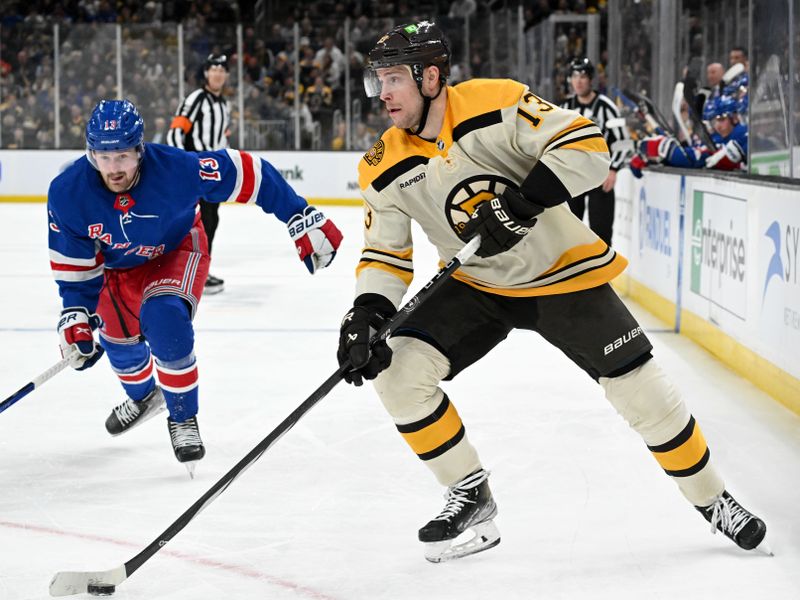 Mar 21, 2024; Boston, Massachusetts, USA; Boston Bruins center Charlie Coyle (13) controls the puck in front of New York Rangers left wing Alexis Lafreniere (13) during the first period at the TD Garden. Mandatory Credit: Brian Fluharty-USA TODAY Sports