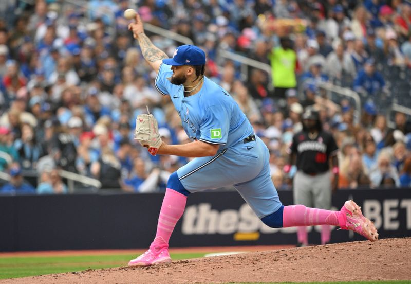 May 12, 2024; Toronto, Ontario, CAN;  Toronto Blue Jays starting pitcher Alek Manoah (6) delivers a pitch against the Minnesota Twins in the third inning at Rogers Centre. Mandatory Credit: Dan Hamilton-USA TODAY Sports