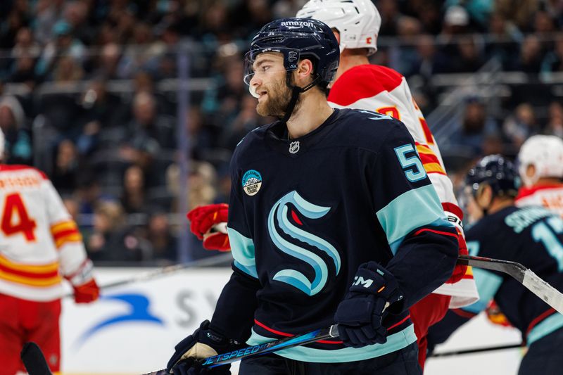 Oct 19, 2024; Seattle, Washington, USA; Seattle Kraken center Shane Wright (51) reacts against the Calgary Flames during the third period at Climate Pledge Arena. Mandatory Credit: Caean Couto-Imagn Images