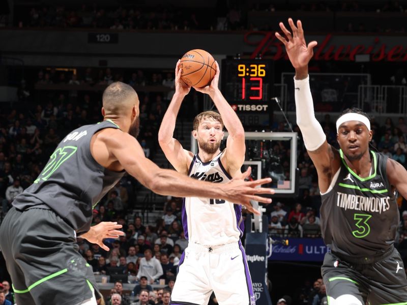 MINNEAPOLIS, MN -  MARCH 1: Domantas Sabonis #10 of the Sacramento Kings handles the ball during the game against the Minnesota Timberwolves on March 1, 2024 at Target Center in Minneapolis, Minnesota. NOTE TO USER: User expressly acknowledges and agrees that, by downloading and or using this Photograph, user is consenting to the terms and conditions of the Getty Images License Agreement. Mandatory Copyright Notice: Copyright 2024 NBAE (Photo by David Sherman/NBAE via Getty Images)