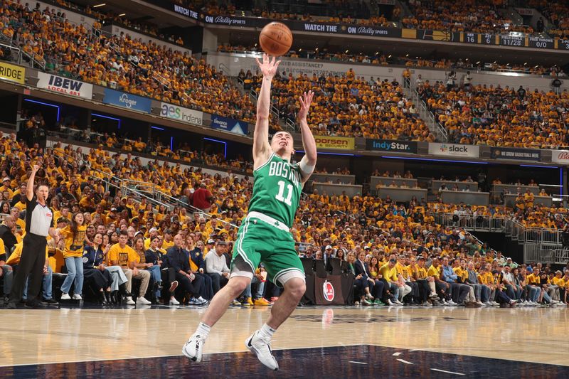 INDIANAPOLIS, IN - MAY 27: Payton Pritchard #11 of the Boston Celtics shoots the ball during the game against the Indiana Pacers during Game 4 of the Eastern Conference Finals of the 2024 NBA Playoffs on May 27, 2024 at Gainbridge Fieldhouse in Indianapolis, Indiana. NOTE TO USER: User expressly acknowledges and agrees that, by downloading and or using this Photograph, user is consenting to the terms and conditions of the Getty Images License Agreement. Mandatory Copyright Notice: Copyright 2024 NBAE (Photo by Nathaniel S. Butler/NBAE via Getty Images)