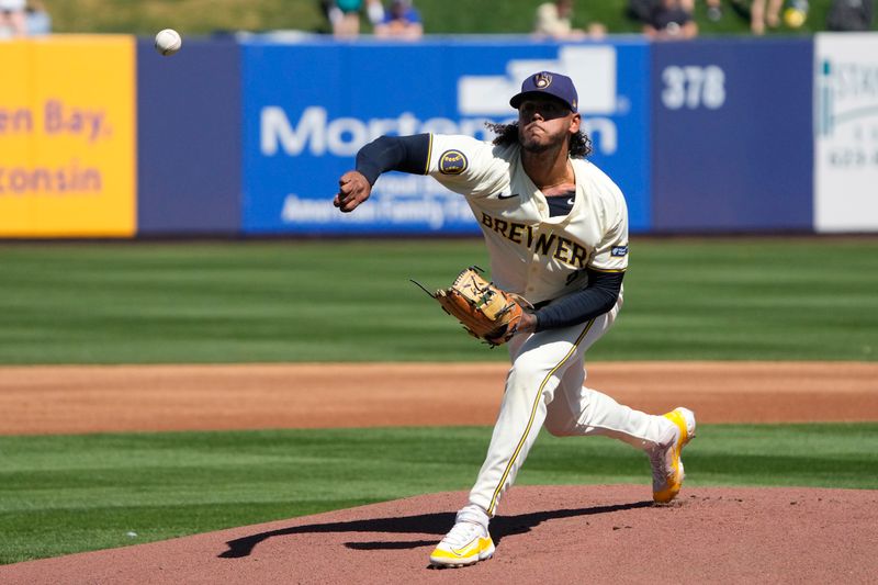 Mar 9, 2024; Phoenix, Arizona, USA; Milwaukee Brewers starting pitcher Freddy Peralta (51) throws against the Seattle Mariners in the first inning at American Family Fields of Phoenix. Mandatory Credit: Rick Scuteri-USA TODAY Sports