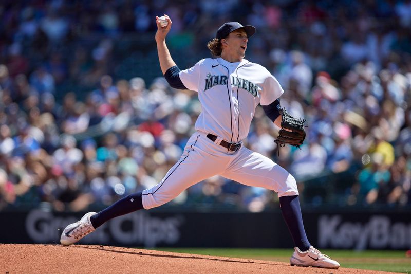 Aug 2, 2023; Seattle, Washington, USA; Seattle Mariners starting pitcher Logan Gilbert  works during the first inning at T-Mobile Park. Mandatory Credit: John Froschauer-USA TODAY Sports