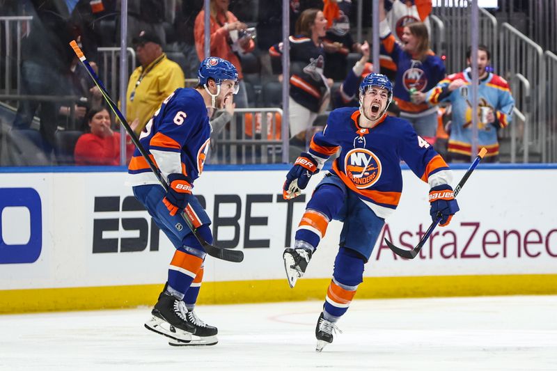 Apr 27, 2024; Elmont, New York, USA; New York Islanders center Jean-Gabriel Pageau (44) celebrates after scoring a goal in the third period against the Carolina Hurricanes in game four of the first round of the 2024 Stanley Cup Playoffs at UBS Arena. Mandatory Credit: Wendell Cruz-USA TODAY Sports