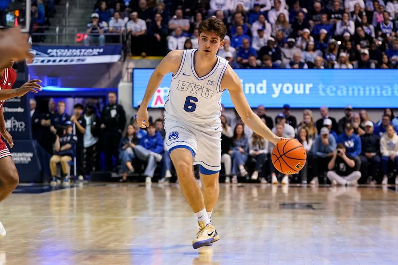 Mar 7, 2026; Provo, Utah, USA; BYU Cougars guard Aleksej Kostić (6) dribbles the ball during the first half against the Texas Tech Red Raiders at Marriott Center. Mandatory Credit: Aaron Baker-Imagn Images 