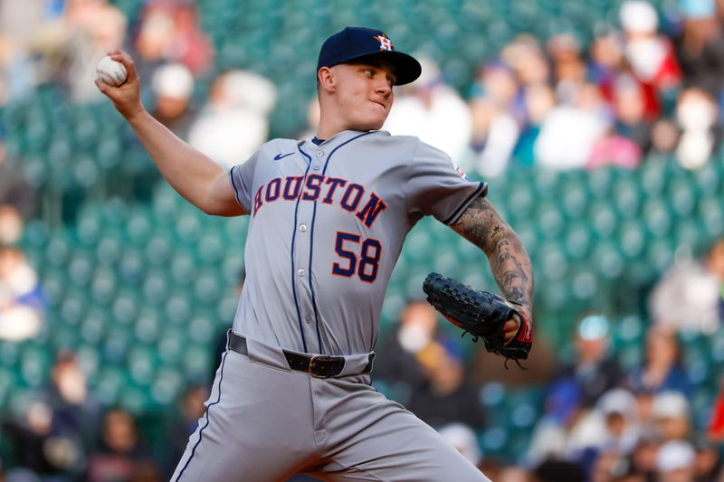 May 28, 2024; Seattle, Washington, USA; Houston Astros starting pitcher Hunter Brown (58) throws against the Seattle Mariners during the first inning at T-Mobile Park. Mandatory Credit: Joe Nicholson-USA TODAY Sports