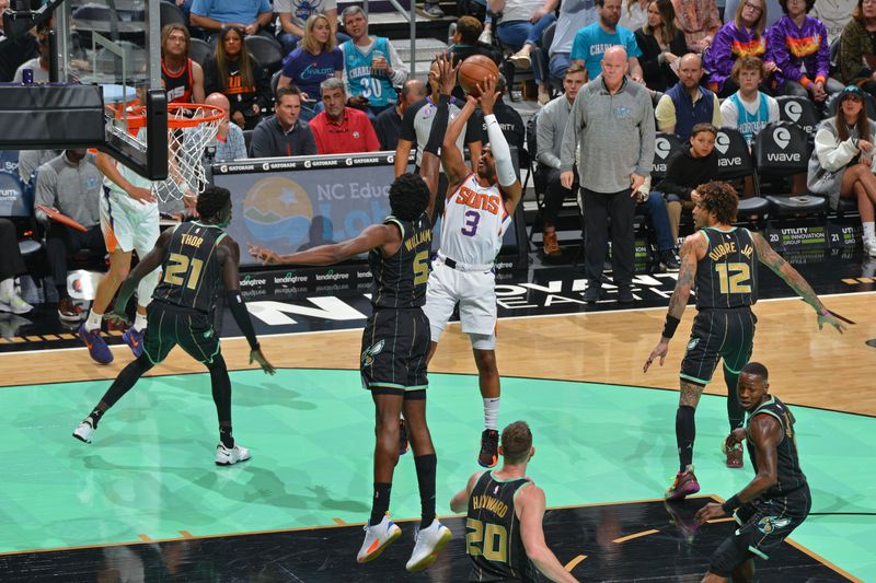 CHARLOTTE, NC - MARCH 1: Chris Paul #3 of the Phoenix Suns shoots the ball against the Charlotte Hornets on March 1, 2023 at Spectrum Center in Charlotte, North Carolina. NOTE TO USER: User expressly acknowledges and agrees that, by downloading and or using this photograph, User is consenting to the terms and conditions of the Getty Images License Agreement. Mandatory Copyright Notice: Copyright 2023 NBAE (Photo by Jesse D. Garrabrant/NBAE via Getty Images)