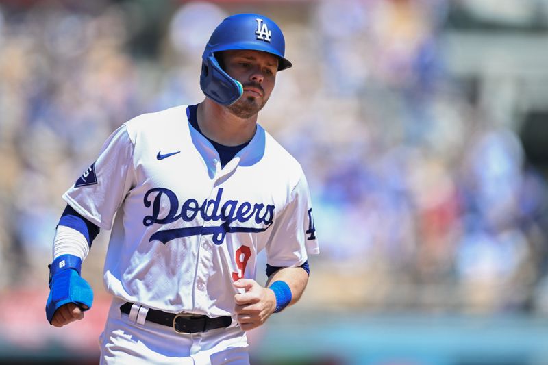 Apr 21, 2024; Los Angeles, California, USA; Los Angeles Dodgers second baseman Gavin Lux (9) runs home after designated hitter Shohei Ohtani (17) (not pictured) hits a home run against the New York Mets during the third inning at Dodger Stadium. Mandatory Credit: Jonathan Hui-USA TODAY Sports