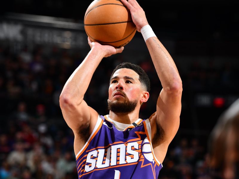 PHOENIX, AZ - NOVEMBER 27: Devin Booker #1 of the Phoenix Suns shoots a free throw during the game against the Brooklyn Nets on November 27, 2024 at Footprint Center in Phoenix, Arizona. NOTE TO USER: User expressly acknowledges and agrees that, by downloading and or using this photograph, user is consenting to the terms and conditions of the Getty Images License Agreement. Mandatory Copyright Notice: Copyright 2024 NBAE (Photo by Barry Gossage/NBAE via Getty Images)