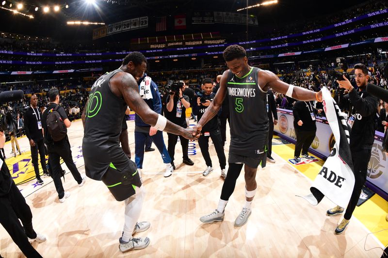 LOS ANGELES, CA - APRIL 30: Julius Randle #30 and Anthony Edwards #5 of the Minnesota Timberwolves celebrate after the game against the Los Angeles Lakers during Round One Game Five of the 2025 NBA Playoffs on April 30, 2025 at Crypto.Com Arena in Los Angeles, California. NOTE TO USER: User expressly acknowledges and agrees that, by downloading and/or using this Photograph, user is consenting to the terms and conditions of the Getty Images License Agreement. Mandatory Copyright Notice: Copyright 2025 NBAE (Photo by Adam Pantozzi/NBAE via Getty Images)