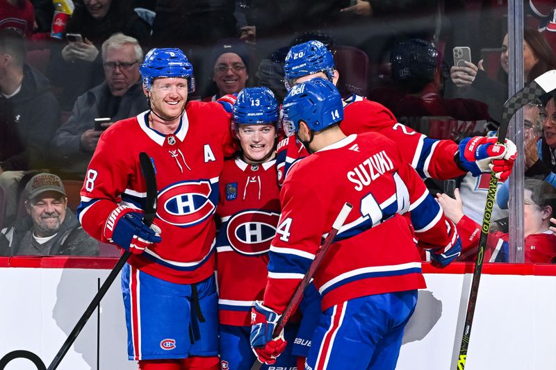 Oct 12, 2024; Montreal, Quebec, CAN; Montreal Canadiens right wing Cole Caufield (13) celebrates with defenseman Mike Matheson (8), center Nick Suzuki (14) and left wing Juraj Slafkovsky (20) after scoring a goal against the Ottawa Senators during the first period at Bell Centre. Mandatory Credit: David Kirouac-Imagn Images