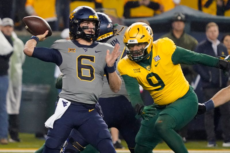 Nov 25, 2023; Waco, Texas, USA; West Virginia Mountaineers quarterback Garrett Greene (6) throws downfield against the Baylor Bears during the first half at McLane Stadium. Mandatory Credit: Raymond Carlin III-USA TODAY Sports