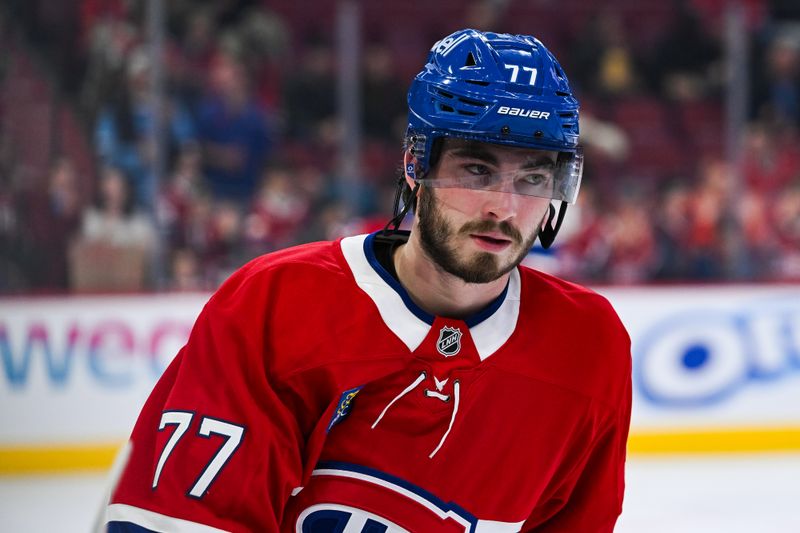 Nov 4, 2025; Montreal, Quebec, CAN; Montreal Canadiens center Kirby Dach (77) looks on during warm-up before the game against the Philadelphia Flyers at Bell Centre. Mandatory Credit: David Kirouac-Imagn Images