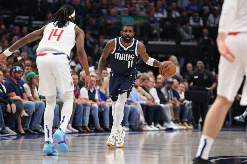 DALLAS, TX - APRIL 28: Kyrie Irving #11 of the Dallas Mavericks dribbles the ball during the game against the LA Clippers during Round 1 Game 4 of the 2024 NBA Playoffs on April 28, 2024 at the American Airlines Center in Dallas, Texas. NOTE TO USER: User expressly acknowledges and agrees that, by downloading and or using this photograph, User is consenting to the terms and conditions of the Getty Images License Agreement. Mandatory Copyright Notice: Copyright 2024 NBAE (Photo by Tim Heitman/NBAE via Getty Images)