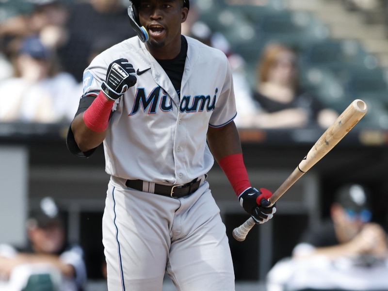 Jun 10, 2023; Chicago, Illinois, USA; Miami Marlins right fielder Jesus Sanchez (7) reacts after a walk with the bases loaded against the Chicago White Sox during the ninth inning at Guaranteed Rate Field. Mandatory Credit: Kamil Krzaczynski-USA TODAY Sports