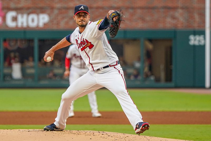 Aug 23, 2023; Cumberland, Georgia, USA; Atlanta Braves starting pitcher Charlie Morton (50) pitches against the New York Mets during the first inning at Truist Park. Mandatory Credit: Dale Zanine-USA TODAY Sports