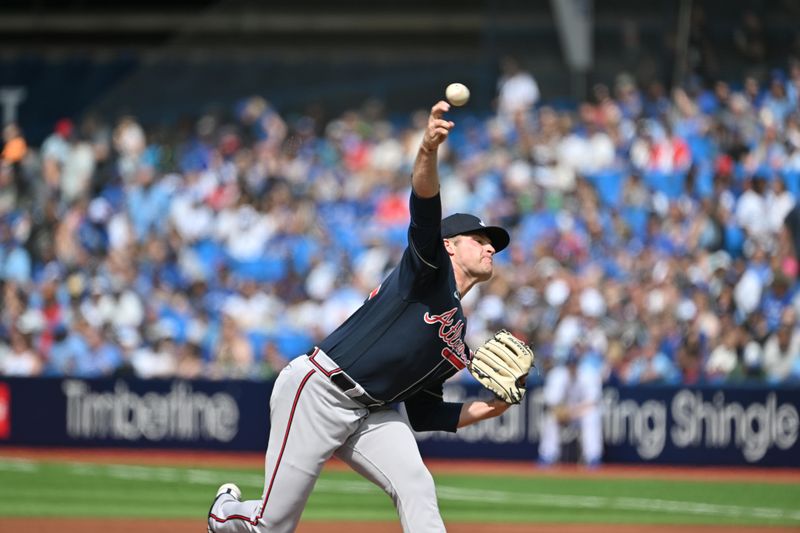 May 13, 2023; Toronto, Ontario, CAN; Atlanta Braves starting pitcher Bryce Elder (55) delivers a pitch against the Toronto Blue Jays in the first inning at Rogers Centre. Mandatory Credit: Dan Hamilton-USA TODAY Sports