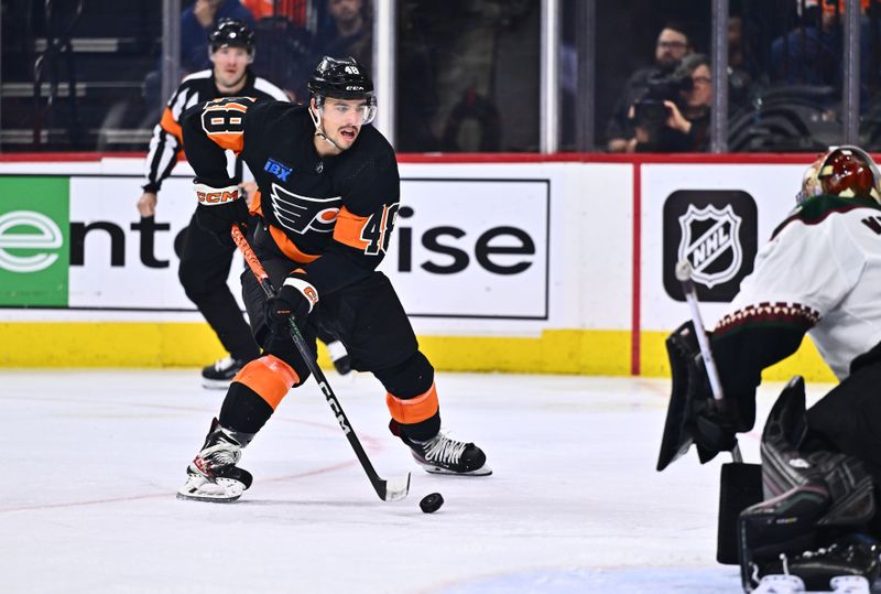 Feb 12, 2024; Philadelphia, Pennsylvania, USA; Philadelphia Flyers center Morgan Frost (48) controls the puck against the Arizona Coyotes in the third period at Wells Fargo Center. Mandatory Credit: Kyle Ross-USA TODAY Sports