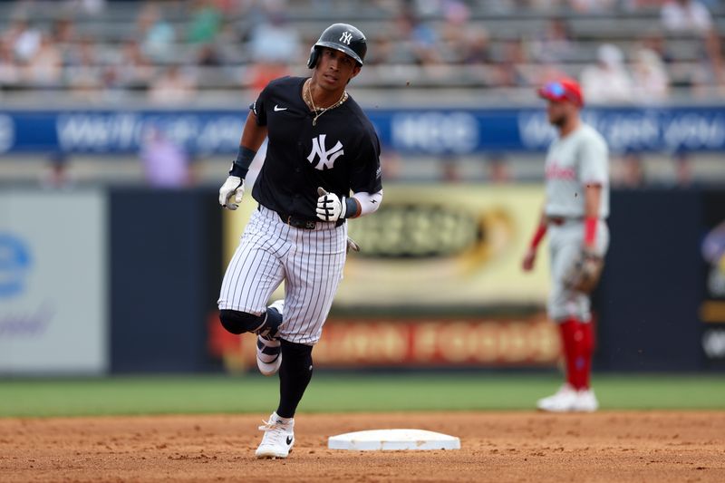 Mar 18, 2024; Tampa, Florida, USA;  New York Yankees first baseman Oswaldo Cabrera (95) runs the bases after hitting a solo home run against the Philadelphia Phillies in the third inning at George M. Steinbrenner Field. Mandatory Credit: Nathan Ray Seebeck-USA TODAY Sports