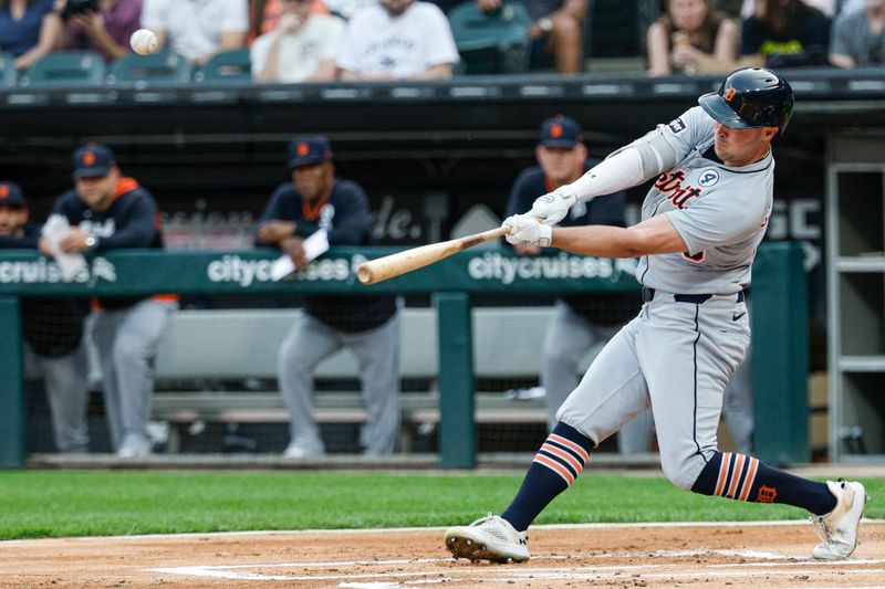 Jun 2, 2025; Chicago, Illinois, USA; Detroit Tigers designated hitter Kerry Carpenter (30) hits a two-run home run against the Chicago White Sox during the first inning at Rate Field. Mandatory Credit: Kamil Krzaczynski-Imagn Images