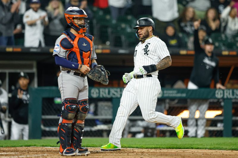 May 13, 2023; Chicago, Illinois, USA; Chicago White Sox third baseman Yoan Moncada (10) scores against the Houston Astros during the eight inning at Guaranteed Rate Field. Mandatory Credit: Kamil Krzaczynski-USA TODAY Sports