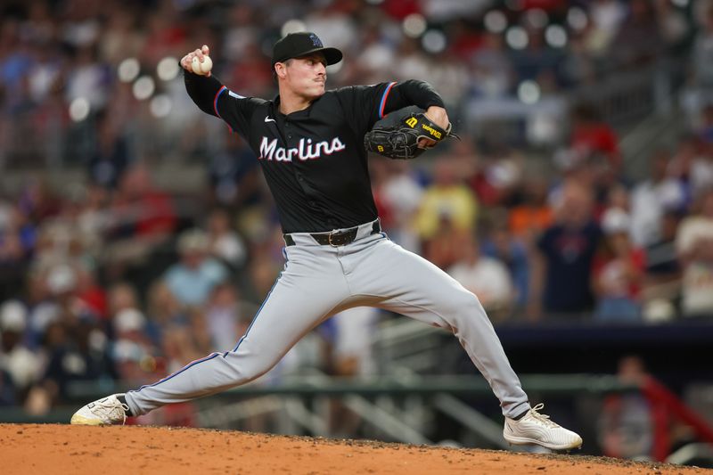 Aug 3, 2024; Atlanta, Georgia, USA; Miami Marlins relief pitcher Calvin Faucher (53) throws against the Atlanta Braves in the ninth inning at Truist Park. Mandatory Credit: Brett Davis-USA TODAY Sports