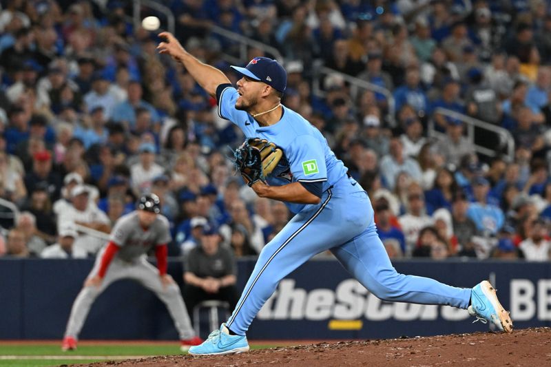 Sep 24, 2025; Toronto, Ontario, CAN;  Toronto Blue Jays relief pitcher Jose Berrios (17) delivers a pitch against the Boston Red Sox in the seventh inning at Rogers Centre. Mandatory Credit: Dan Hamilton-Imagn Images