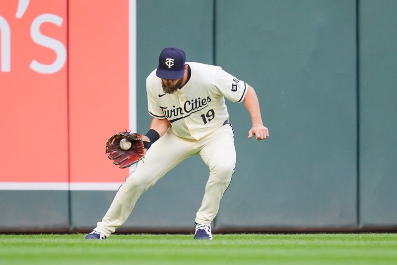 May 6, 2024; Minneapolis, Minnesota, USA; Minnesota Twins outfielder Alex Kirilloff (19) fields a fly ball against the Seattle Mariners in the third inning at Target Field. Mandatory Credit: Brad Rempel-USA TODAY Sports