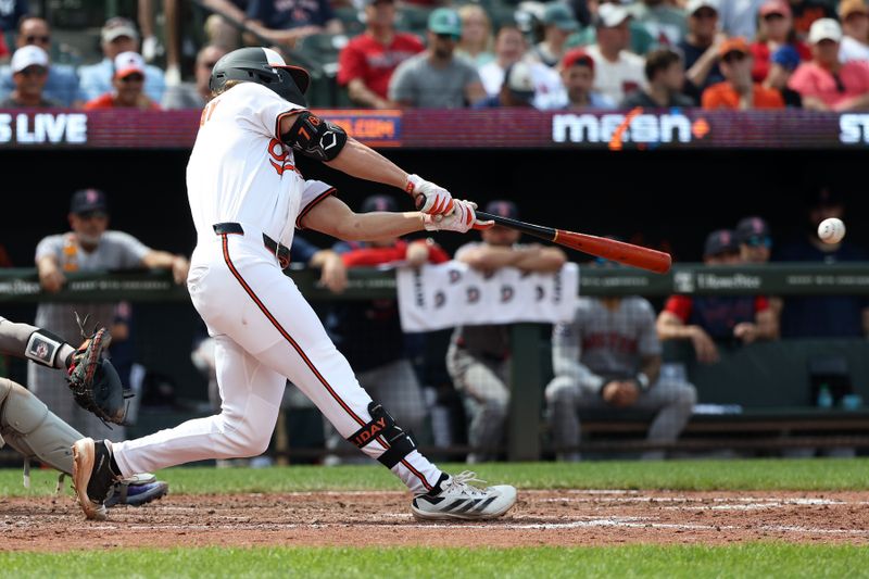 Aug 28, 2025; Baltimore, Maryland, USA; Baltimore Orioles second baseman Jackson Holliday (7) hits a double during the seventh inning against the Boston Red Sox at Oriole Park at Camden Yards. Mandatory Credit: Daniel Kucin Jr.-Imagn Images