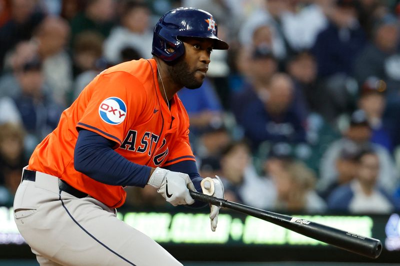 May 10, 2024; Detroit, Michigan, USA;  Houston Astros first baseman Yordan Alvarez (44) hits an RBI single in the eighth inning against the Detroit Tigers at Comerica Park. Mandatory Credit: Rick Osentoski-USA TODAY Sports