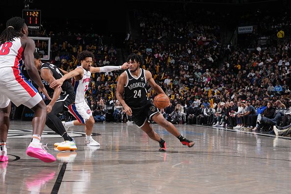 BROOKLYN, NY - DECEMBER 23: Cam Thomas #24 of the Brooklyn Nets drives to the basket during the game against the Detroit Pistons on December 23, 2023 at Barclays Center in Brooklyn, New York. NOTE TO USER: User expressly acknowledges and agrees that, by downloading and or using this Photograph, user is consenting to the terms and conditions of the Getty Images License Agreement. Mandatory Copyright Notice: Copyright 2023 NBAE (Photo by Jesse D. Garrabrant/NBAE via Getty Images)